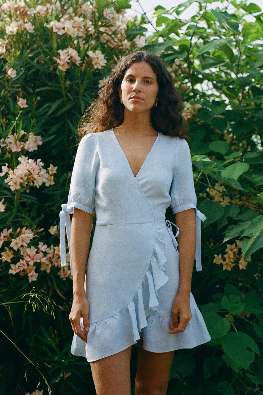 The Catalina Mini Wrap Dress in sky blue SAMPLE